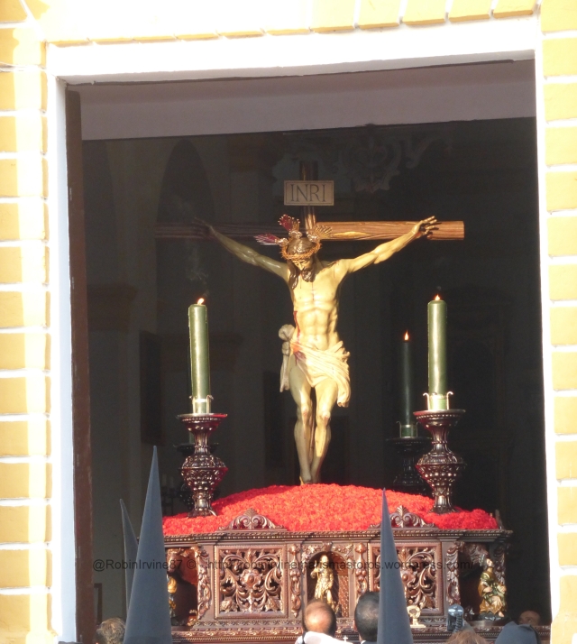 The image of Christ on the cross, borne by men of the town, sallies from the church on Holy Friday, the most important day of Holy Week for Villamanrique.